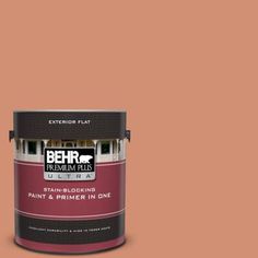 a paint can with the words behr premium plus ultra in red and black on it