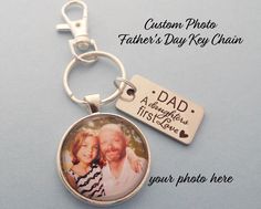 a keychain with a photo on it and a tag attached to the back