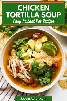 a bowl of chicken tortilla soup with avocado and cilantro