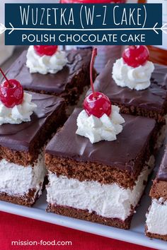 chocolate cake with whipped cream and cherries on top