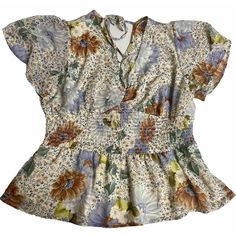 Elevate Your Wardrobe With This Beautiful Meraki Women's Blouse Top In Size M. The Floral Pattern, V-Neckline, And Flutter Sleeves Add A Feminine Touch And The Drawstring Closure Cinches The Waist For A Flattering Fit. This Versatile Blouse Is Perfect For Any Occasion, From Casual Outings To Workwear And Even Weddings. The Material Is Made Of Polyester And Is Machine Washable, Making It Easy To Care For. The Blue Color And Ruffle Accents Give A Charming Touch To The Blouse. This Blouse Is Ideal V Neck Blouse, Spring Season, Flutter Sleeve, Blouses For Women, Work Wear, Top Blouse, Blue Color, V Neck, Womens Tops