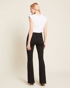 In a sophisticated dark wash, the Beverly jean features a high-rise waist that is fitted through the hips and thighs with a subtly flared leg. High quality stretch denim offers a flattering look with a flexible fit. Tuck in any of our tops and add sky-high heels for an elongating silhouette. Chic Dark Wash Stretch Flares, Chic Mid-rise Flare Jeans, Chic High Rise Flares For Workwear, Chic Mid-rise Flares With Five Pockets, Veronica Beard, Sky High, Black 7, Crew Neck Tee, Black Tee