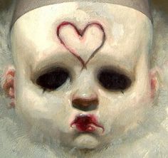 a painting of a child's face with a heart painted on the top of it