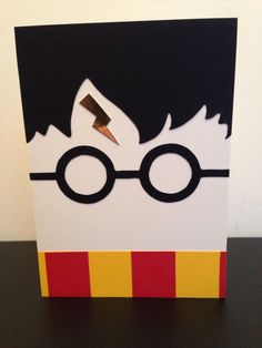 a harry potter birthday card on a table