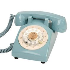 an old - fashioned rotary phone is shown on a white background