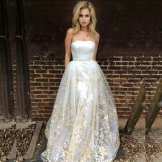 Welcome to our store.This dress could be custom made.there are no extra cost to do custom size and color.Service email: service@winkbridal.com. Item Detail: 1. Silhouette: A Line2. Hem-length: Floor Length3. Fabric: Tulle4. Neckline: Strapless5. Sleeve: Sleeveless6. Embellishment: Lace Appliques7. Back Details: Zipper Up8. Lining: Yes9. Build-in Bra: Yes10. Size: Standard Size or Custom Size11. Picture Color: White Tulle With Gold Lace(For custom color,please check our color chart) Detachable Skirt, Graduation Party Dresses, Strapless Prom Dress, Dresses Satin, White Prom Dress, Prom Dresses For Teens, Wedding Dresses Satin, White Dress Party, A Line Prom Dresses