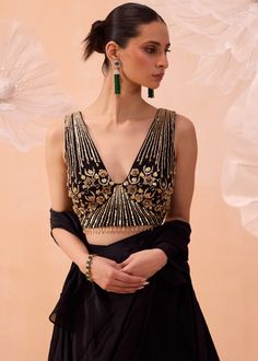 A black ruffle saree paired with beautiful all gold hand embroidered floral and tonal zardozi work. Fashion Course, Ruffled Saree, Black Embroidered Blouse, Ethnic Wears, Zara Shahjahan, Blouse Necklines, Ethnic Beauty, Embroidery Blouses, Zardozi Work