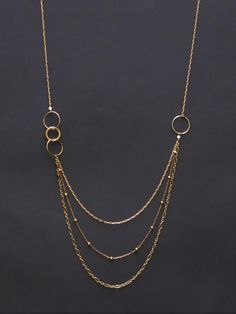 asymmetrical necklace multi rows in raw brass, length 88 cm plus 4 cm extension chain. Several different chain rows. With 2 small boho glass beads. Necklace Reference, Asymmetrical Necklace, Small Boho, Multi Strand Necklace, Strand Necklace, Raw Brass, Multi Strand, Circles, Glass Beads