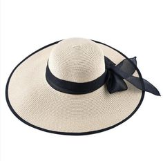 Flaunt your style and complete your look with the perfect headwear. Our variety of hats makes it easy to find one to match every outfit and occasion. Wide brim straw hat with bow knot will keep you looking fabulous and feeling protected from the sun. Our hats are a hit with drag queens. Material: Polyester, Straw Item Type: Sun Hat Head circumference: 22"-23" / 56cm-59cm // Luxury Beige Boater Hat With Flat Brim, Cheap Wide Brim Party Hat, Luxury Boater Hat For Ascot With Flat Brim, Luxury White Boater Hat, Luxury White Flat Brim Bucket Hat, Luxury White Modern Hats, Luxury Classic Boater Hat With Flat Crown, Cheap Wide Brim Hat For Party, Luxury Curved Brim Bucket Hat