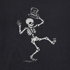 a skeleton wearing a top hat and holding a tennis racquet in its hand