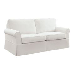 a white couch with two pillows on it