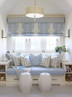 a living room filled with lots of furniture and decor on top of it's walls