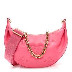 This is an authentic LOUIS VUITTON Calfskin Bubblegram Over The Moon in Dragon Fruit. This soft and supple shoulder bag is featured in puffy calfskin in pink and is embroidered with the Louis Vuitton monogram, known as "Bubblegram'. The bag can be carried by hand with a chain or over the shoulder with an adjustable strap. The top unzips to a pink monogram fabric interior with a pocket. Moon Dragon, Pink Monogram, Over The Moon, Dragon Fruit, Authentic Louis Vuitton, Louis Vuitton Monogram, The Moon, Calf Skin, Adjustable Straps