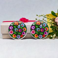 Our Silver Mexican Floral Stud Cabochon Earrings showcase the retro vintage style that is currently trending. These earrings feature a unique cabochon design with a flat underside and outwardly curved upper side, crafted with clear acrylic glass for an affordable option. The colorful and vibrant Mexican-inspired designs make these earrings a beautiful and thoughtful gift for any occasion. Show your loved one that it's the thought that counts, and that good intentions are more important than expe Cabochon Earrings, Expensive Gifts, Good Intentions, Floral Studs, Retro Vintage Style, Floral Earrings, Vintage Boho, Clear Acrylic, Precious Stones