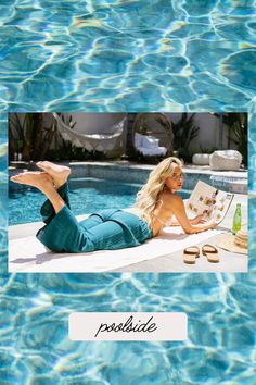 Model is tanning by the pool, reading a book, and soaking up the sun. She is wearing white bikini top and verdigris wide leg lounge pants. Background is aesthetic pool water texture.