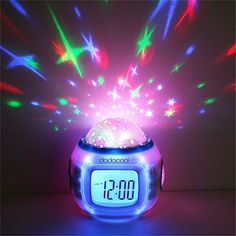 an alarm clock with colorful lights in the shape of a maple leaf and canadian flag