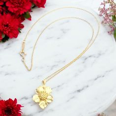 About This Piece: The Vintage Tiffany & Co 18K Yellow Gold Dogwood Flower Pendant Necklace is a charming piece that captures the delicate beauty of the dogwood flower. Crafted in rich 18k yellow gold, the pendant features detailed petals and a textured finish, hanging elegantly from a matching chain. A timeless representation of nature's elegance. Metal: 18k Yellow Gold Length: 16" Weight: 5.2 grams Pendant: 22mm x 15mm Hallmarks: Chain: Tiffany&Co 750Pendant: T&Co 750 T3573red Chanel Ring, Dogwood Flower, Watch Cufflinks, Hermes Jewelry, Dogwood Flowers, Vintage Tiffany, Delicate Beauty, Flower Pendant Necklace, Cartier Ring