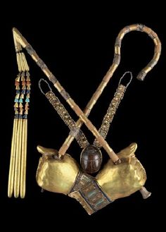 an image of a horse's head with two spears and other items in it