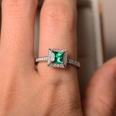 Emerald ring princess cut emerald emerald engagement ring | Etsy Silver Radiant Cut Emerald Ring With Halo Setting, Cubic Zirconia Princess Cut Halo Ring, Princess Cut Cubic Zirconia Halo Ring, Emerald Cut Halo Ring For Promise, Promise Ring With Princess Cut Brilliant Emerald, Silver Radiant Cut Emerald Ring For May Birthstone, Promise Ring Emerald With Brilliant Princess Cut, Radiant Cut Silver Emerald Ring For May Birthstone, Silver Wedding Ring With Halo Setting And Emerald Cut