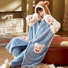 Prepare to stay cozy and kawaii all winter long with our Hooded Robe Winter Pajamas. These delightful pajama sets are designed to keep you warm while embracing your love for all things cute. With several charming styles to choose from, you can cuddle up in comfort and cuteness. Here's why you'll adore our Hooded Robe Winter Pajamas: Key Features: Superior Comfort: Made from high-quality materials, our pajamas offer supreme comfort. The soft and plush fabric feels gentle against your skin, making Christmas Elf Outfit, Winter Loungewear, Kawaii Games, Christmas Tree Dress, Kawaii Bags, Kawaii Backpack, Comfy Winter, Elf Clothes, Hooded Robe