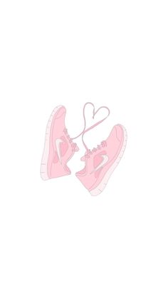 two pink sneakers with hearts hanging from the top and bottom, against a white background