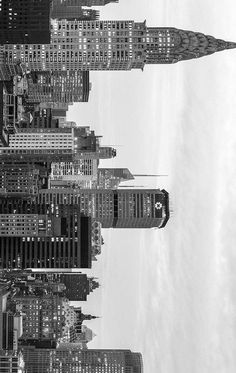 black and white photograph of skyscrapers in new york city