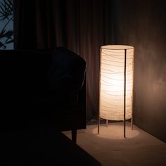 a lamp that is lit up in the dark