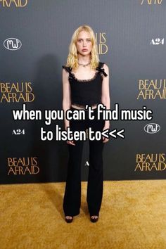 a woman standing in front of a black background with the words when you can't find music to listen to