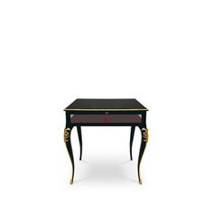 a small black table with gold trimmings on the top and bottom, against a white background