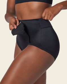 This classic postpartum girdle comfortably compresses your mid-to-lower tummy. Its front panel is made of double-layered PowerSlim® fabric for firm compression. Adjustable Velcro sides allow you to find your perfect fit and choose your own compression level. The stretchy waistband and leg bands are covered for a comfortable fit without panty lines. With no hooks or zippers, this is the ideal panty to wear as you get back into shape, while protecting your c-section incision or recovering from a n Compressive Shapewear Bottoms With Wide Waistband, Compression Shapewear For Yoga, Stretch Full Coverage Shapewear Bottoms, Full Coverage Stretch Shapewear Bottoms, Supportive High Waist Fitted Bottoms, Supportive Fitted High-waist Bottoms, Supportive Full Coverage Shapewear, Supportive Solid Color Shapewear Bottoms, Supportive Stretch Shapewear With Built-in Shorts