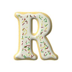 the letter person is decorated with sprinkles and frosting on white background