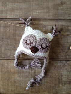 Baby Owl Owlette, cream and taupe sleeping owl. Crochet owl, with or without ties.  Made to order, please allow 7 to 10 business days for orders,  Please specify size  as they are on an average. Please measure circumference of head for the closest measurement for your order, and or color changes.  Thank you for stopping by! Owl Crochet, Types Of Hats, Baby Owl, Owl Baby, Crochet Owl, Knitted Wit, Beanie Pattern, Baby Owls, Crochet Beanie