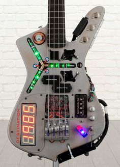 a guitar made out of electronic parts and wires