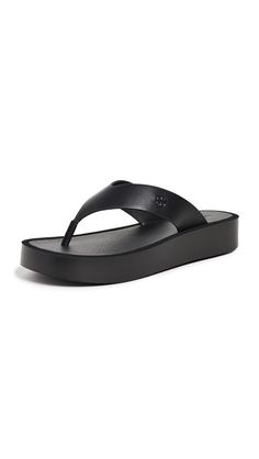 PRICES MAY VARY. Rubber sole Foam midsole, Raised logo, Thong strap Heel: 1.5in / 35mm Tory Burch Sandals Black, Latest Sandal, Platform Flip Flops, Tory Burch Sandals, Leather Flip Flops, Thong Sandals, Strap Heels, Platform Sandals, Black Sandals