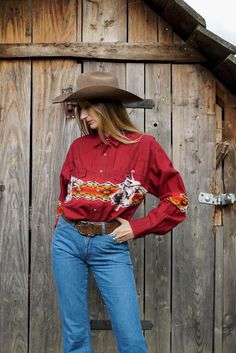 90s vintage Wrangler western shirt crimson red cowboy shirt featuring a southwestern border print and a cowboy on a horse  two front chest pockets, pearl snap button in great vintage condition size on the tag: M measurements (measured flat): *pit to pit 58cm *shoulder to shoulder 50cm *total length 76cm *sleeve 58cm Please excuse the creases, it's impossible to carry the iron while shooting out in the wilderness :) The shirt was washed and is ready to wear Model is 170 cm tall and usually wears Cowboy On A Horse, Cowboy Shirt, Cowboys Shirt, Cowgirl Western, Vintage Wrangler, Cow Boy, Western Shirt, Mens Oxfords, Western Shirts