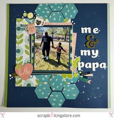 a scrapbook page with an image of a father and son holding hands