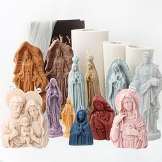 a group of ceramic figurines sitting next to each other