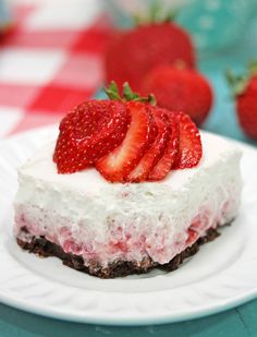 a piece of cheesecake with strawberries on top