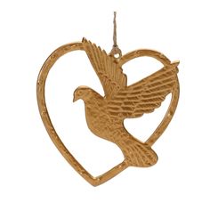 a gold heart shaped ornament with a bird on it's wing in the center