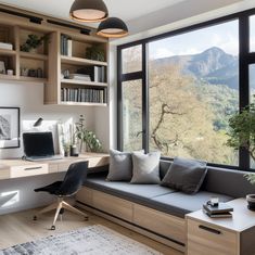 a living room filled with furniture and a large window covered in lots of natural greenery