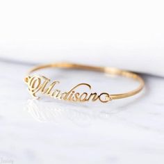 N A M E ∙ B A N G L E ∙ B R A C E L E T The most unique jewelry you can find, the perfect gift for you or your loved one. W H Y ∙ Y O U 'L L ∙ L O V E ∙ I T• It's dainty and can be worn every day• A special piece you'll treasure for life• High-quality materials and attention to detail. • Tarnish-proof, Waterproof, and Hypoallergenic • Replacement Guarantee and Fade proof warranty D E T A I L S • Material: Available in The Highest Quality 14K Gold Vermeil, 14K Rose Gold Vermeil, or 925 Silver• Al Graduation Gifts For Sister, Custom Bangle, Hand Cuff Bracelet, Personalised Bangle, Sister Bracelet, Bangles For Women, Rose Gold Bangle, Gold Armband, Personalized Bracelet