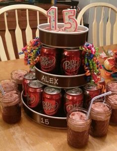 a birthday cake made to look like a stack of cans