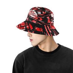 "Rave inspired red and black all over print bucket hat by BigTexFunkadelic that is reversible; the flip side is solid black. Made from premium cotton, this classic accessory adds another layer of cool to your outfit. * 9.00 Oz. Made from premium cotton. * Eyelets for breathability. * Size (approx): Brim: 2.44\", Side: 3.00\", Perimeter (top): 21.26\", Perimeter (brim): 34.65\". * Please wash it gently by hand for keeping its shape." Retro Black Brimmed Bucket Hat, Retro Black Adjustable Bucket Hat, Retro Adjustable Black Bucket Hat, Red Bucket Hat For Streetwear, Trendy Black Reversible Bucket Hat, Reversible Black Bucket Hat For Spring, Casual Black Reversible Hat, Casual Red Bucket Hat With Short Brim, Casual Adjustable Red Bucket Hat