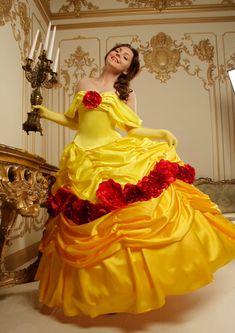 Belle dress is grandiose. This dress is perfect for Belle's flamboyant and unique cosplay. A very beautiful and well-chosen yellow color makes the dress bright, but very pleasing to the eye, and red red roses give the dress a special charm. The set includes a dress (consisting of a corset and a skirt decorated with roses), gloves and a fluffy petticoat. The dress is in two parts; - the corset is very beautifully shaped and has a lacing in the center of the back, which allows you to perfectly adjust the tightening and gives the corset a good fit. The corset is also decorated with chiffon straps, a red rose in the center of the front and bright shiny rhinestones. - The skirt consists of several layers. The upper layer of the skirt is decorated with drapery, as well as beautiful large red ros Snow White Costume Dress For Cosplay Events, Yellow Costumes For Cosplay And Themed Events, Snow White Princess Dress For Cosplay Events, Fairytale Dress For Cosplay Events, Yellow Costume Dress For Cosplay Events, Fantasy Dresses For Cosplay Events, Red Dress For Cosplay Events, Red Dress For Cosplay Fancy Dress Events, Fairytale Overbust Cosplay Dress