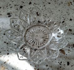 a clear glass bowl sitting on top of a counter