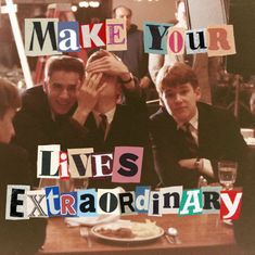 some people sitting at a table with papers on it that say make your lives extraordinary