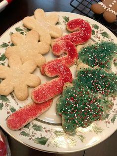 a plate with christmas cookies on it