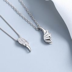 Embrace your celestial love with our Matching Angel Wings Necklaces for Couples. These enchanting necklaces feature delicately designed angel wings, symbolizing protection and love. Crafted with care, they serve as a beautiful reminder of your shared journey. Wear these necklaces with pride and let your love take flight. Material: 3 Layers 18K White Gold Plated 925 Sterling Silver Women Chain Length: 40+5cm ~ 17inches Men Chain Length: 50+5cm ~ 21inches Silver Angel Wings Necklace As Gift, Wing-shaped Sterling Silver Necklace, Spiritual Angel Wings Necklace As A Gift, Necklaces For Couples, Men Chain, Angel Wing Necklace, Women Chain, Wing Necklace, 3 Layers