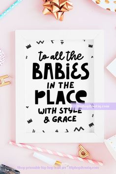 a white frame with the words to all the babies in the place with style and grace