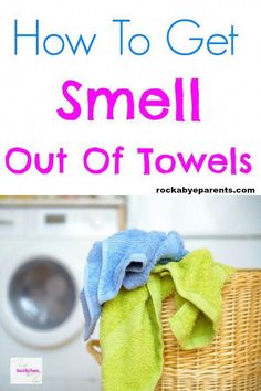 a laundry basket with towels in it and the words how to get smell out of towels